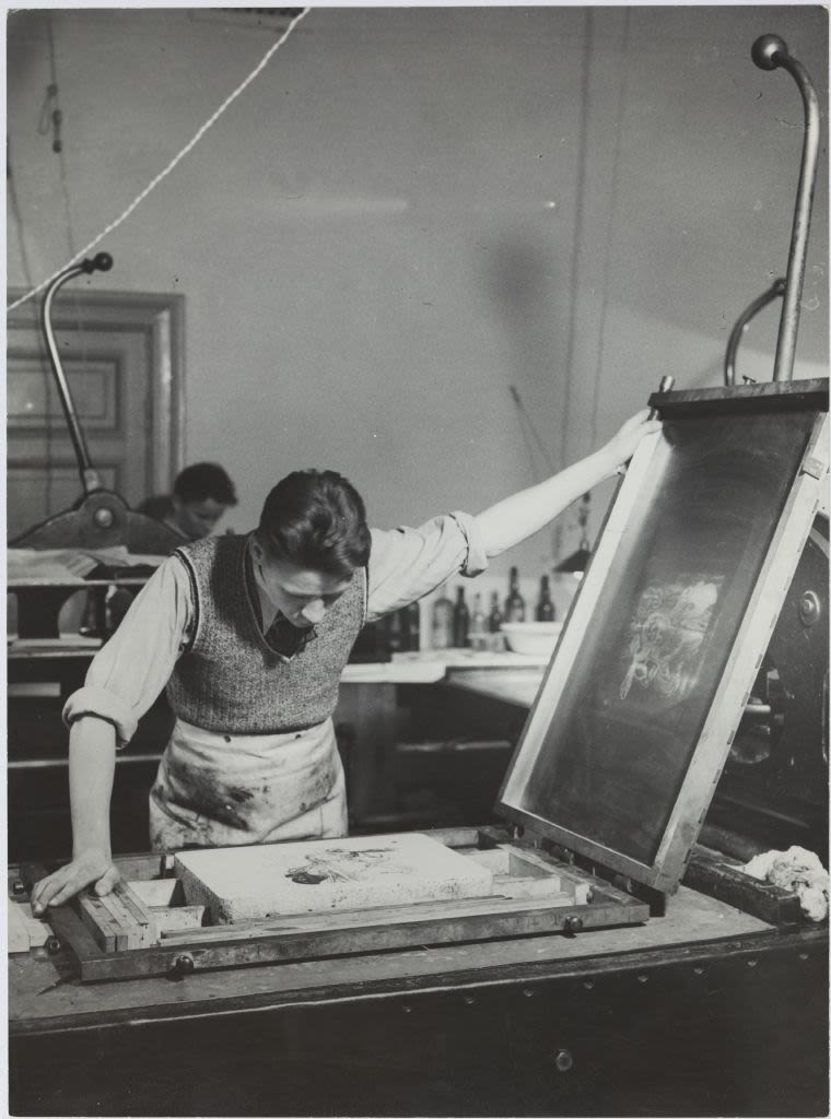 A man working with lithography