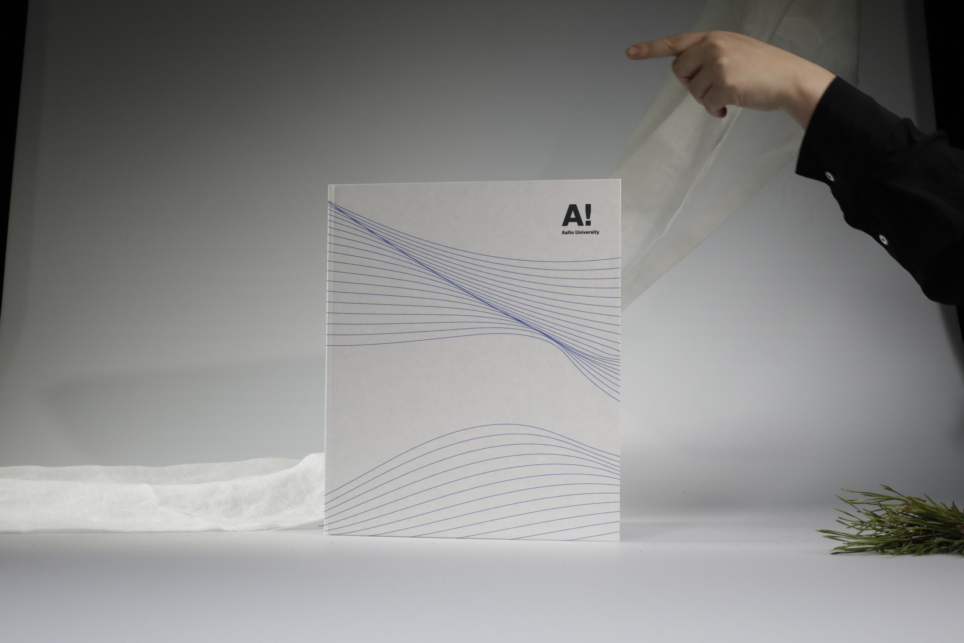 package from front with blue wave and Aalto logi