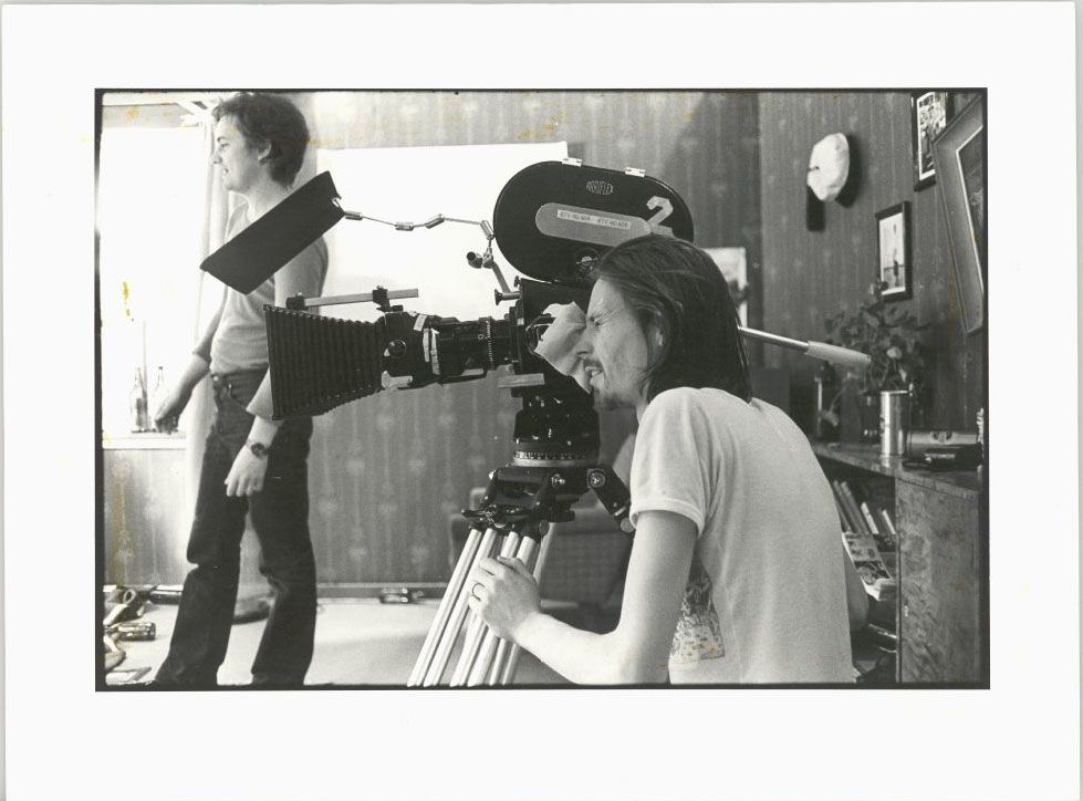 two men and a camera on film set