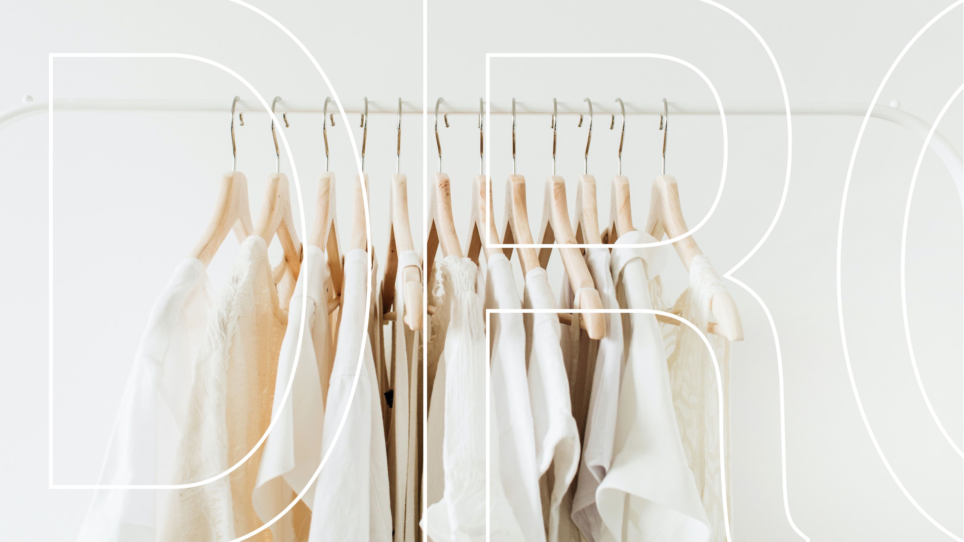 white shirts on clothing rack