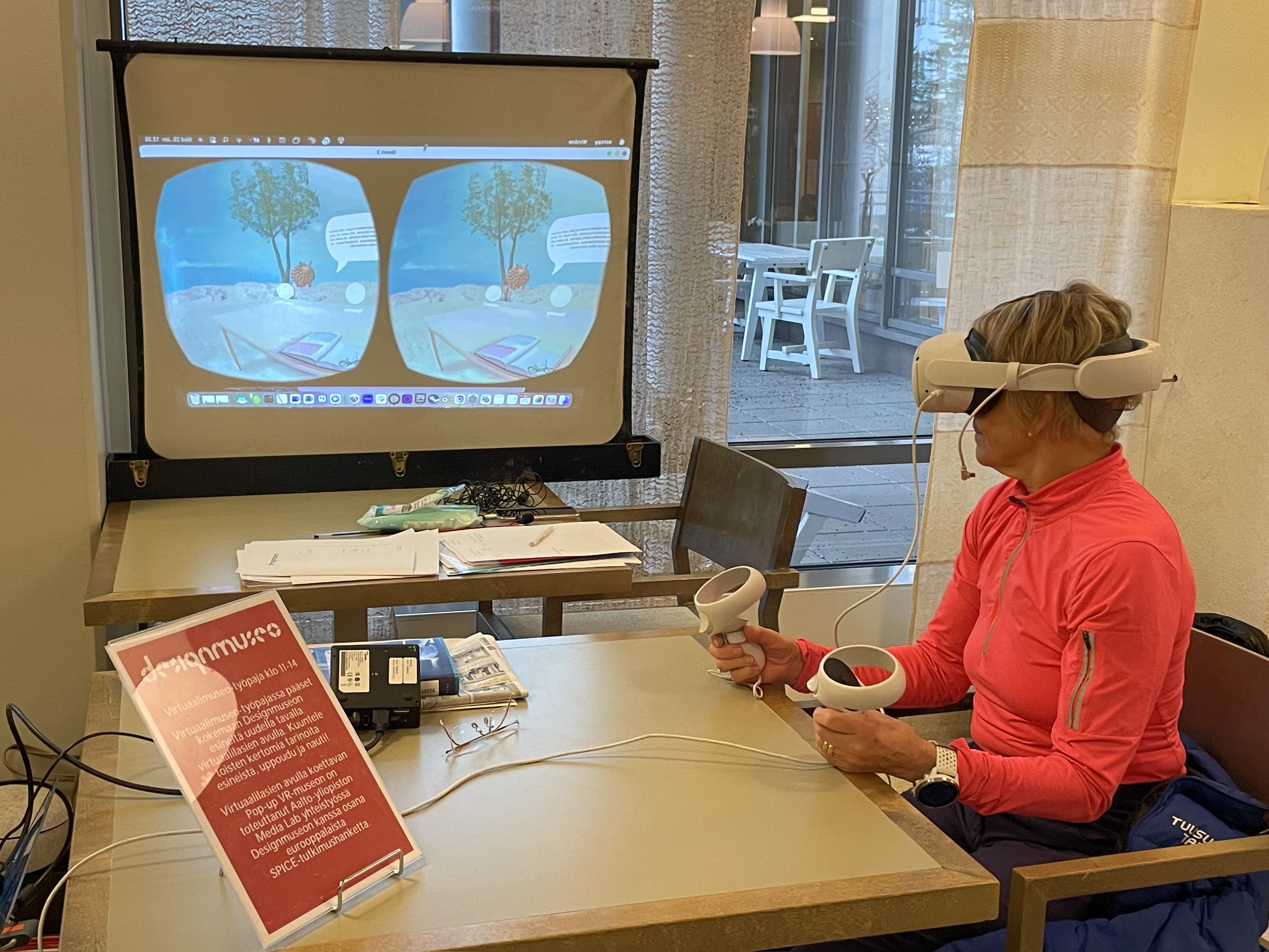 Elderly woman with VR glasses