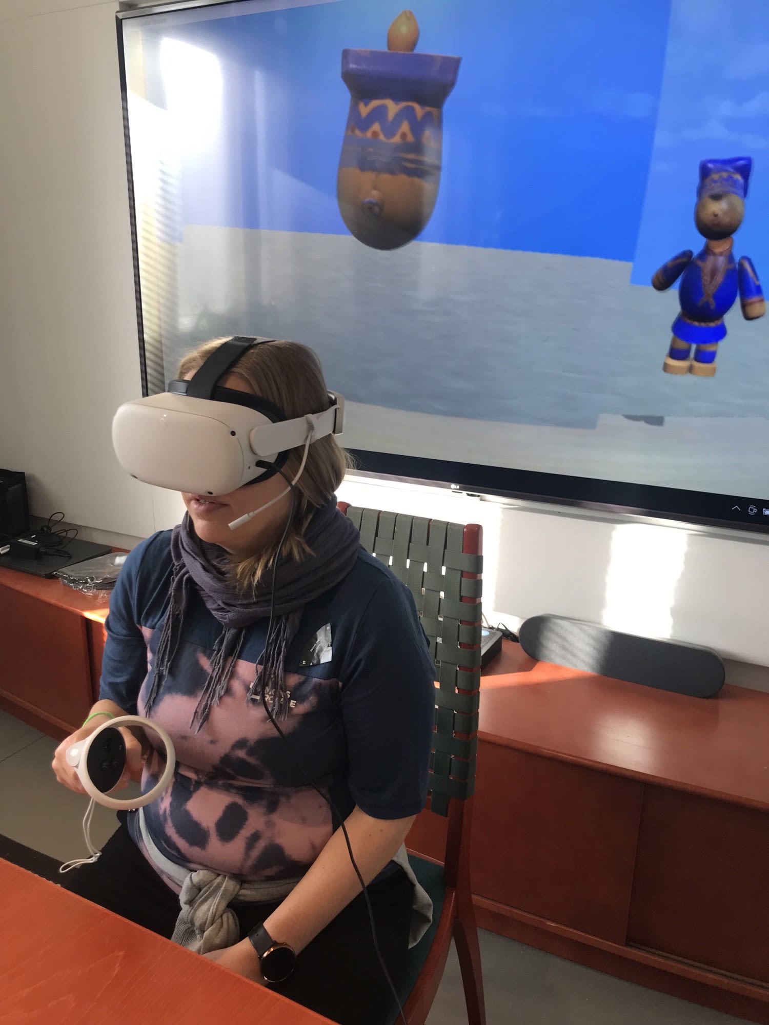Elderly woman with VR glasses