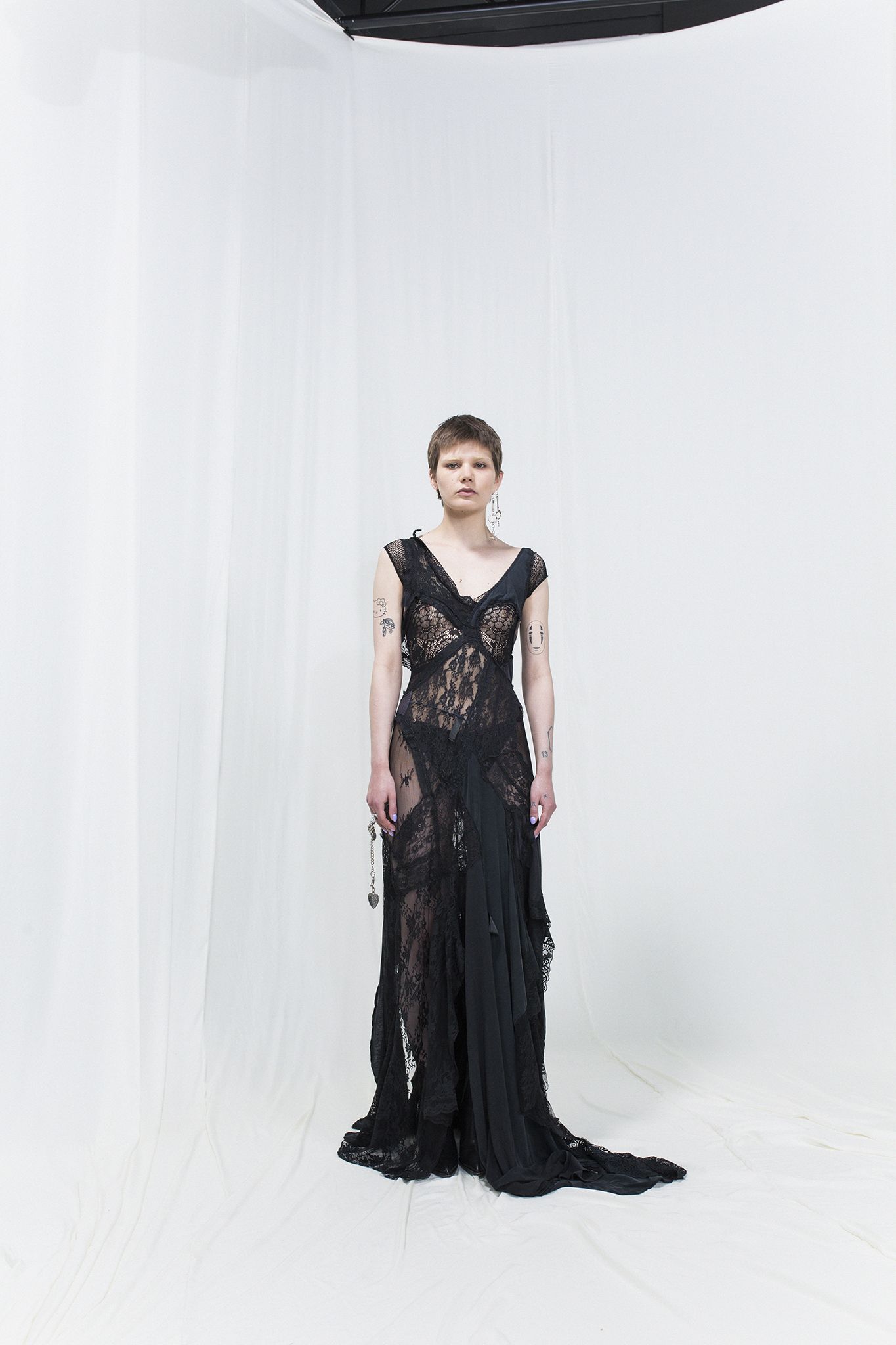woman in black sheer dress