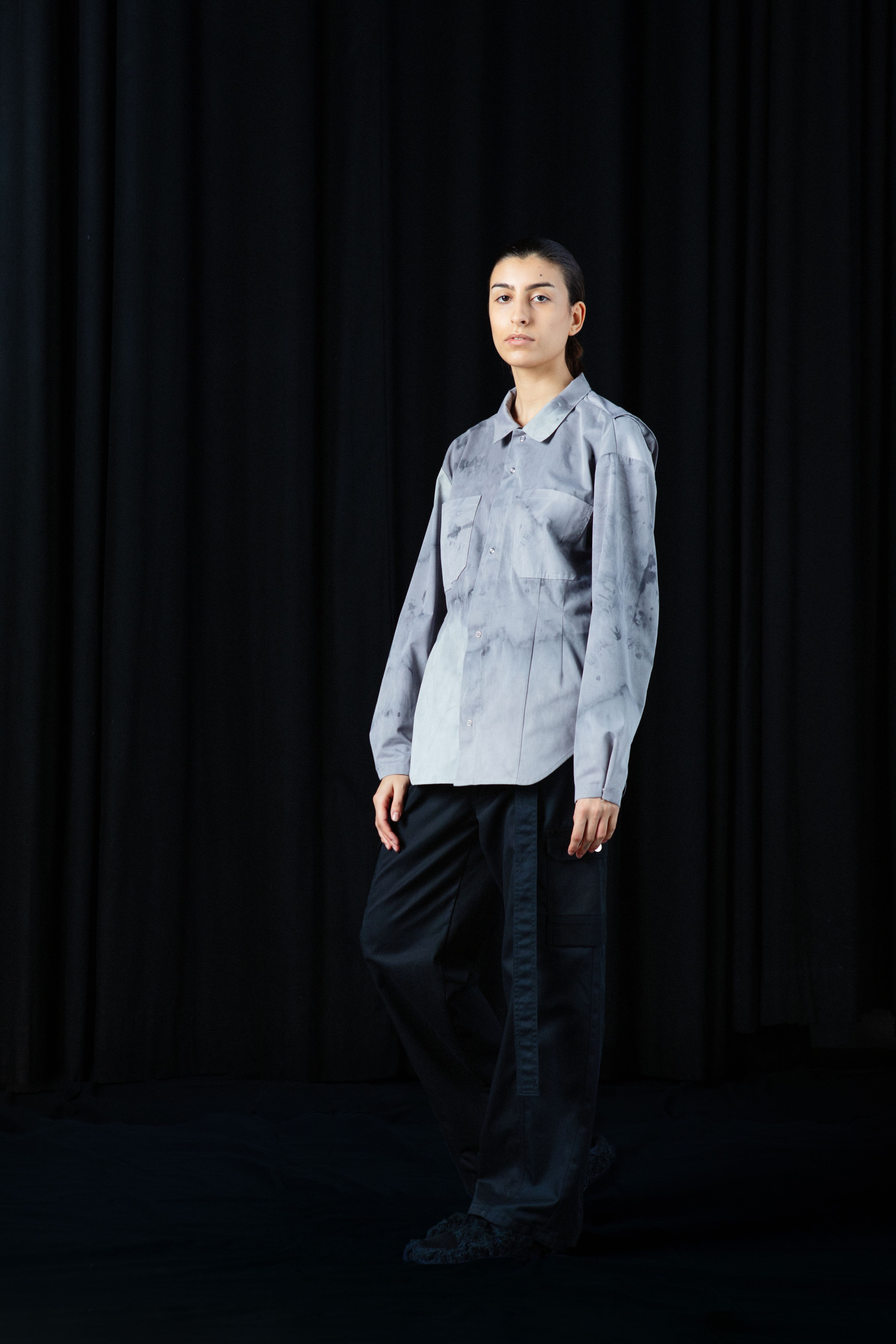 woman in light blue shirt