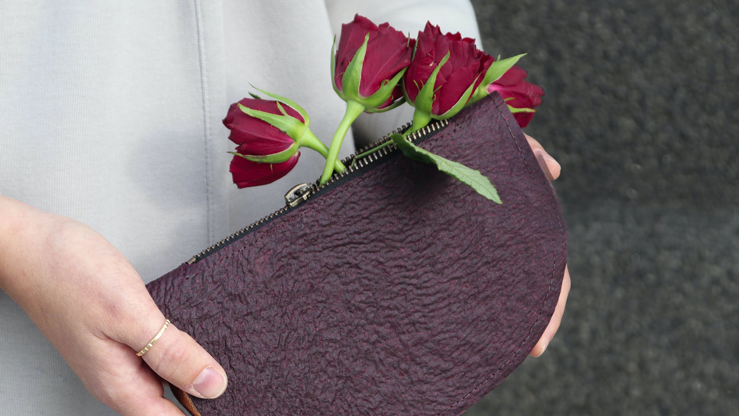 purse made from floral leather with roses inside