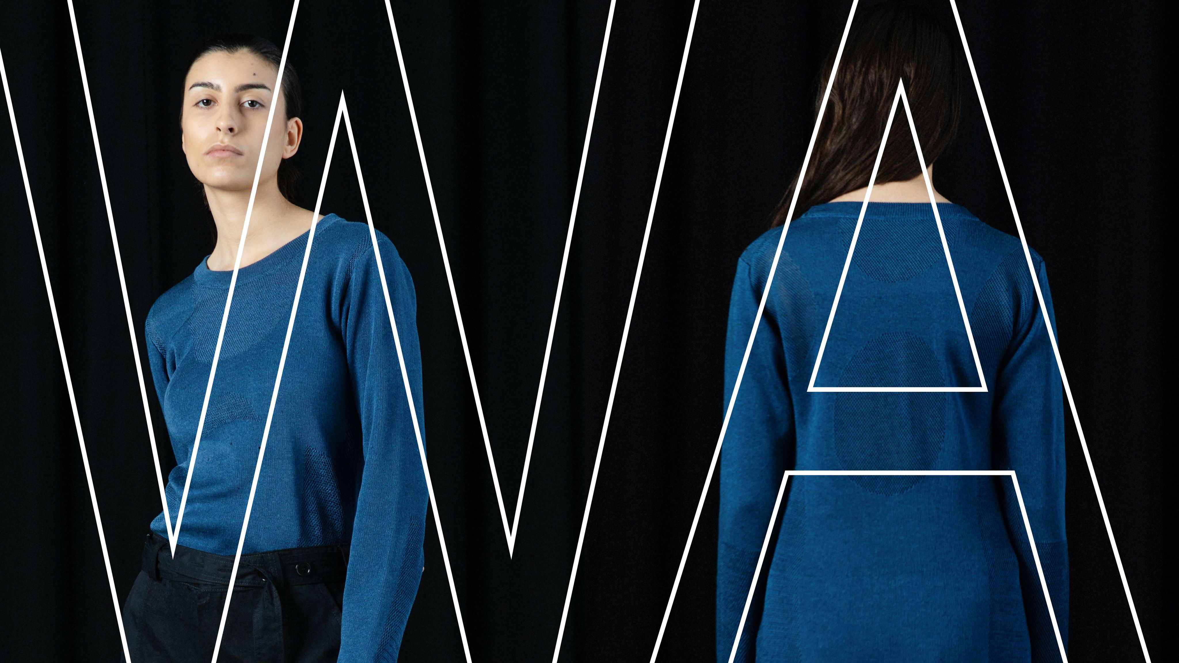 woman in blue shirt on black background