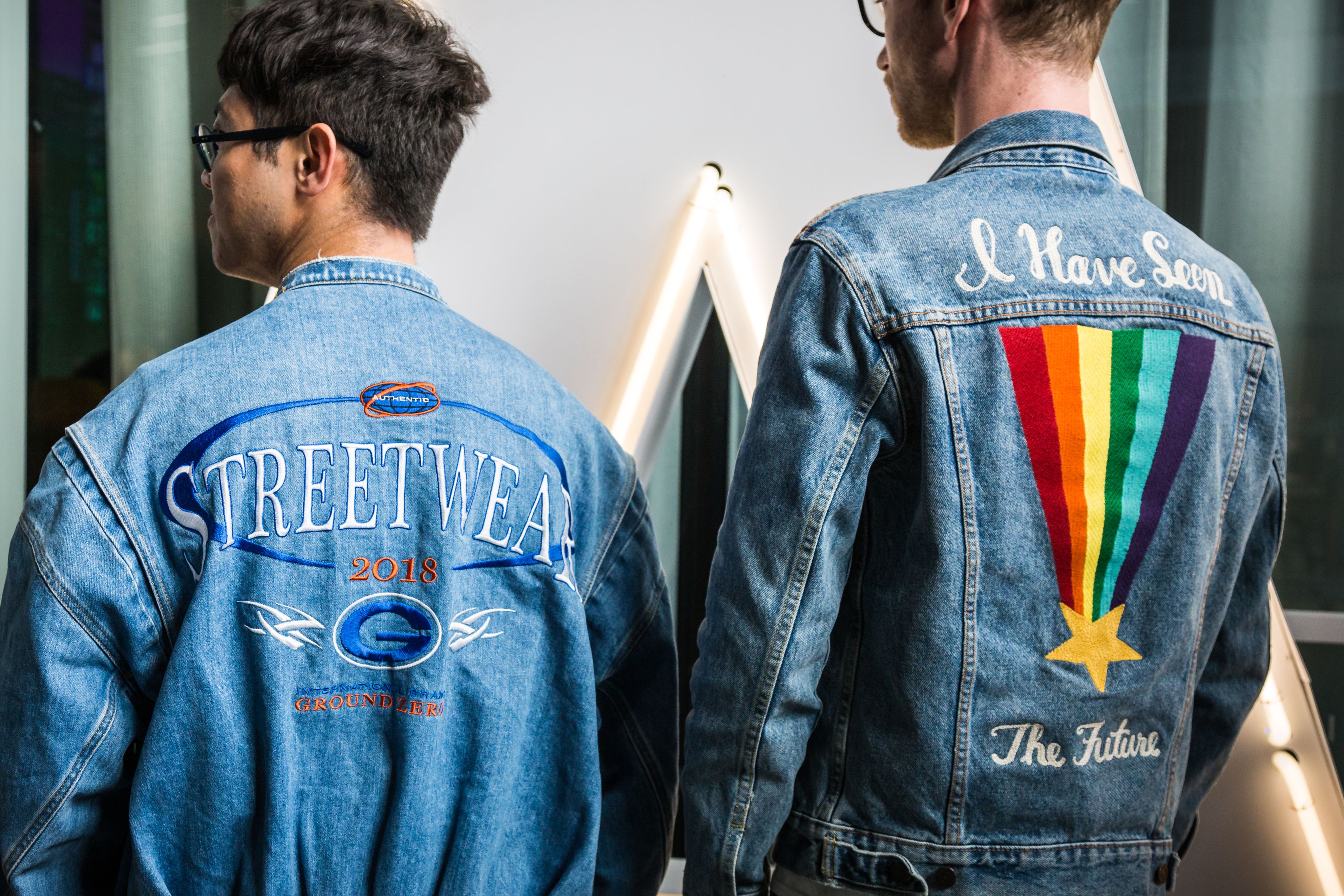 people in mended jeans jackets
